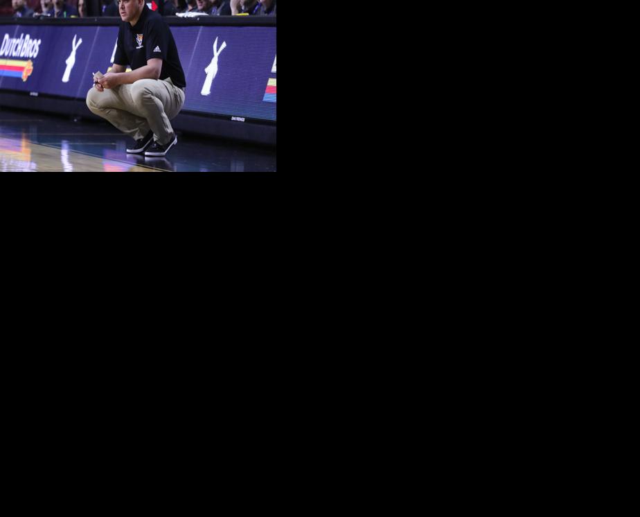 Ryan Looney coaching kneeling front.jpg