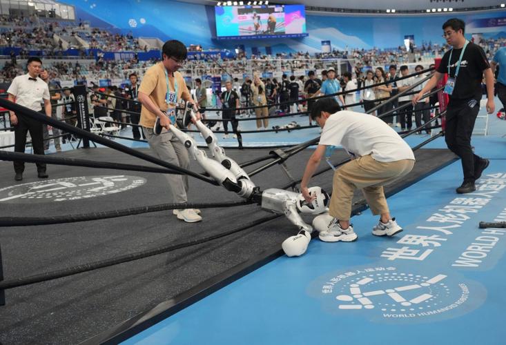 Humanoid robots sprint, play soccer and set records at Beijing games, in photos