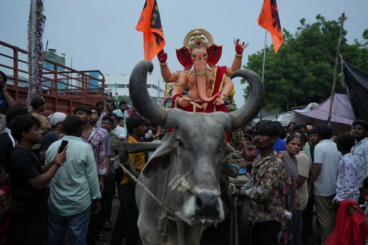 India celebrates the elephant-headed god Ganesha, in photos
