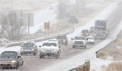 Snow Causing Potentially Hazardous Driving Conditions In Much Of