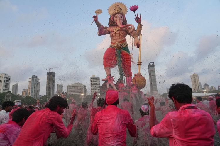 India celebrates the elephant-headed god Ganesha, in photos