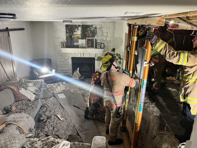 Car in house aftermath