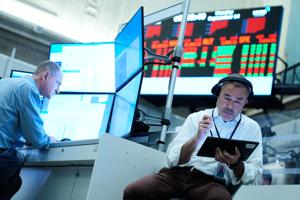 Global shares mostly lower as oil rises and markets await Trump-Xi talks