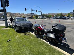 Police: Driver arrested on DUI charge after running red light and crashing into motorcyclist near downtown Pocatello