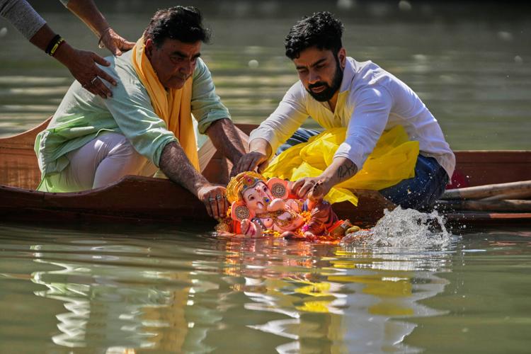 India celebrates the elephant-headed god Ganesha, in photos