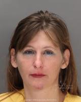 Woman shot after allegedly running over police officer during DUI stop