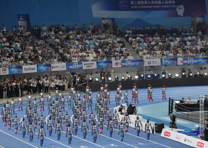 Humanoid robots sprint, play soccer and set records at Beijing games, in photos