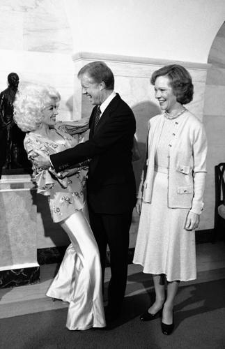 Dolly Parton’s life and career as a country music icon, actor and philanthropist, in photos