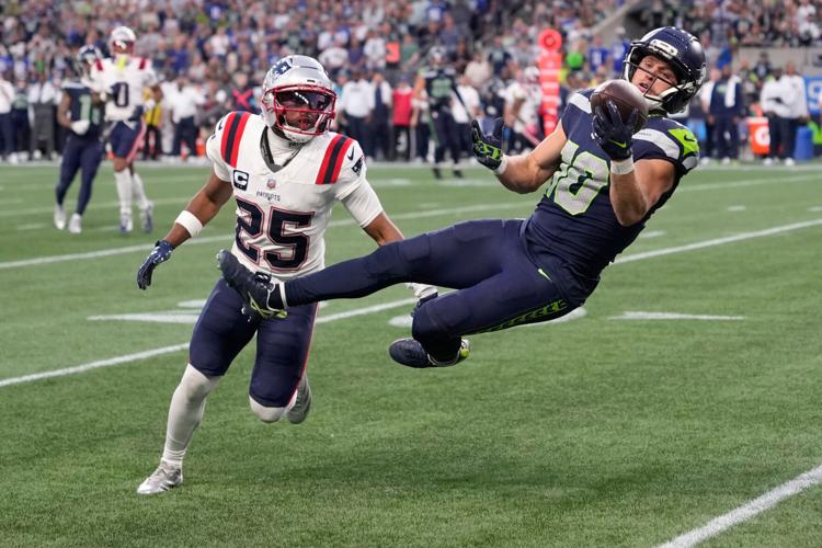 Photos of the NFL season opener, a rare Super Bowl rematch between the Seahawks and Patriots