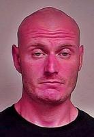 Local fugitive considered armed and dangerous arrested after standoff with police
