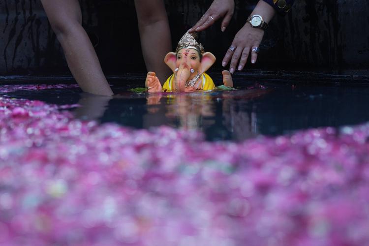 India celebrates the elephant-headed god Ganesha, in photos