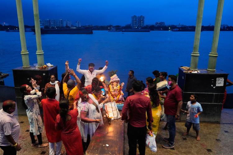 India celebrates the elephant-headed god Ganesha, in photos