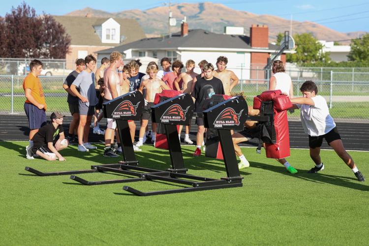 Photos of the Pocatello High School Thunder football team on the