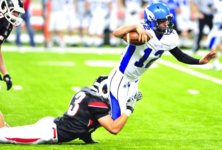 High school football: Coeur d'Alene's killer schedule continues with