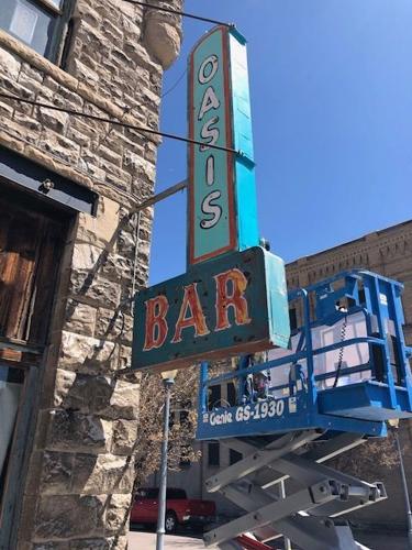 Oasis Bar neon sign relit in Old Town Pocatello after 20 years
