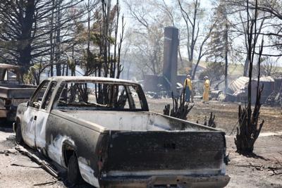 Cold Creek Fire burned pickup trucks (heat wave)