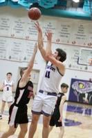 Century boys basketball defeats Highland in first game with fans back in stands
