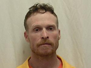 Police: Local man arrested after threatening to stab woman with scissors