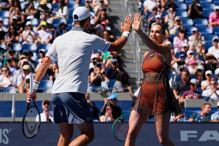 Top tennis stars team up for the U.S. Open mixed doubles tournament, in photos