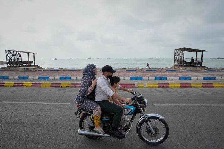 Photos show daily life in Iran on the beach along the Strait of Hormuz
