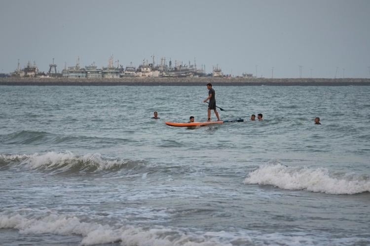 Photos show daily life in Iran on the beach along the Strait of Hormuz
