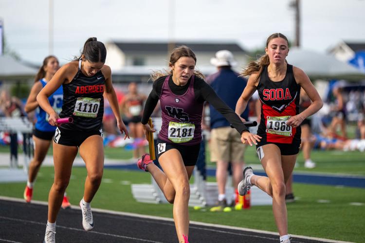 Allie Henderson Anchors the Womens Medlley Realy for a team medal.jpg