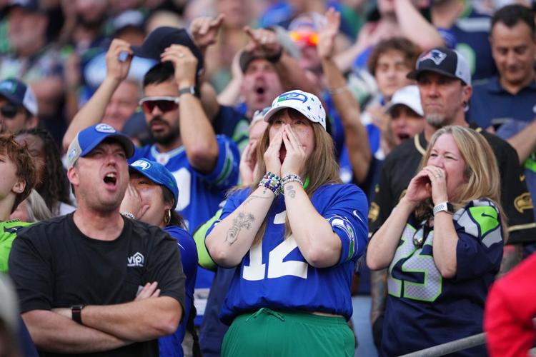 Photos of the NFL season opener, a rare Super Bowl rematch between the Seahawks and Patriots