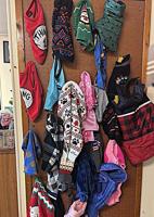 'Wall of Warmth for Animals' coats provided at St. Anthony veterinary clinic