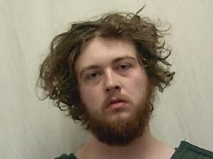 Local man accused of threatening woman with machete surrenders to officers wearing toy handcuffs