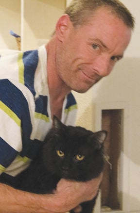 Former resident of burned Monarch building finds his cat that went ...