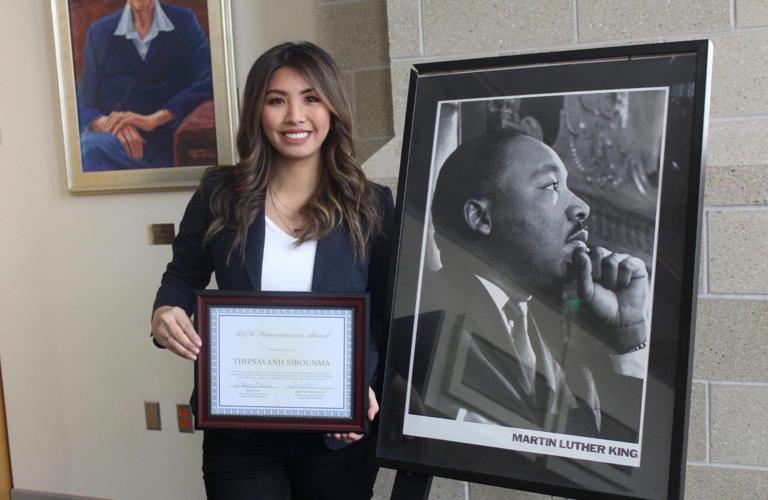 Thipsavanh Sibounma receiving MLK award