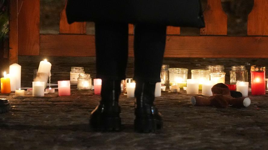 Swiss investigators believe sparkling candles atop wine bottles ...