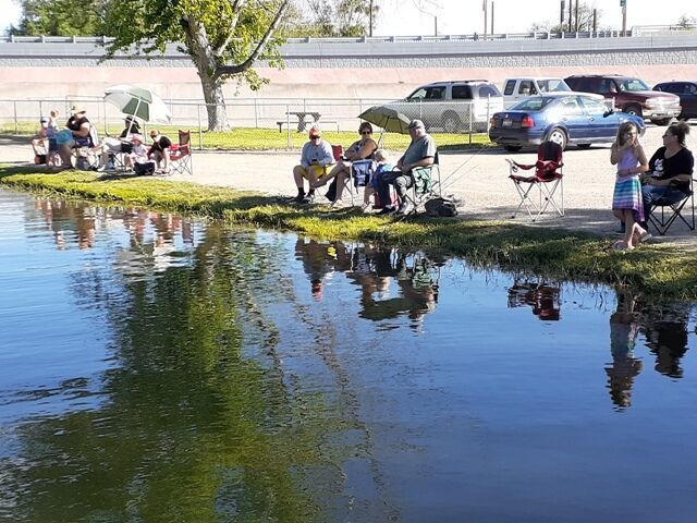 Parents and grandparents fishing with kids.jpg