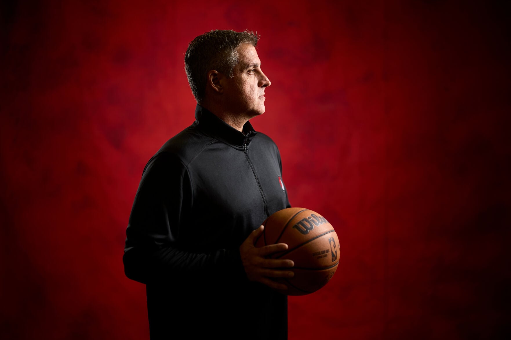 Micah Nori holds a basketball at Portland Trail Blazers media day in September 2026