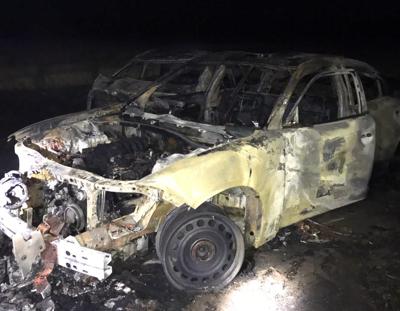Fire-gutted state police car