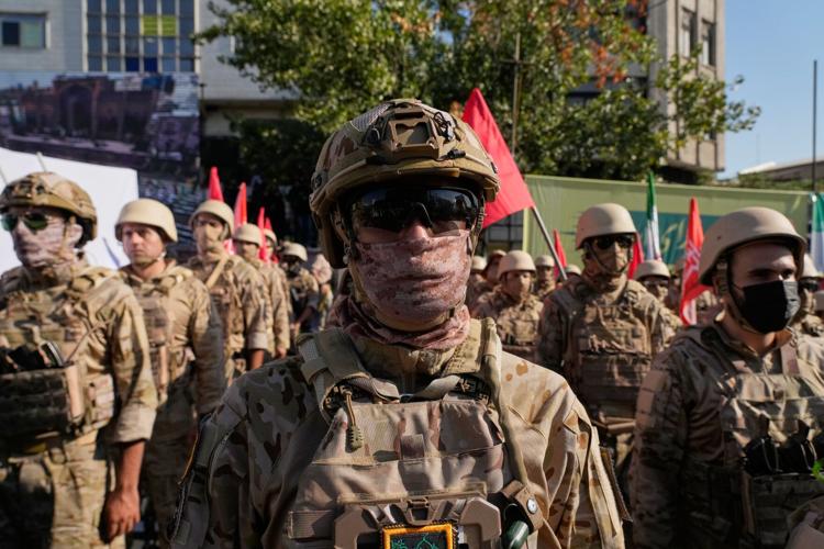 Iran stages massive Tehran rally as volunteers pledge to take up arms, in photos
