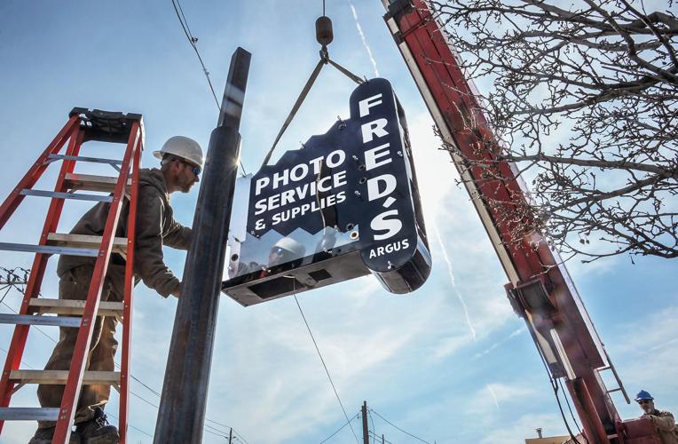 Fred's photo sign rehung