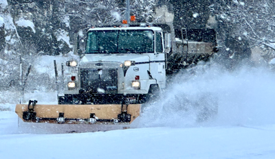 Snow plow file photo stock image winter storm East Idaho