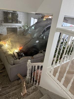 SUV crashes into North Logan family’s living room