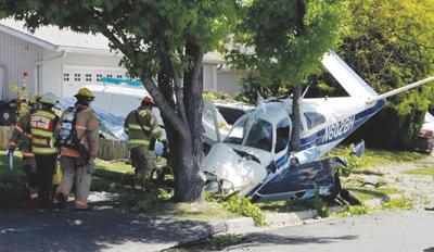 plane oregon marijuana jailed charges crash idahostatejournal medford ore responders passenger pilot saturday scene work