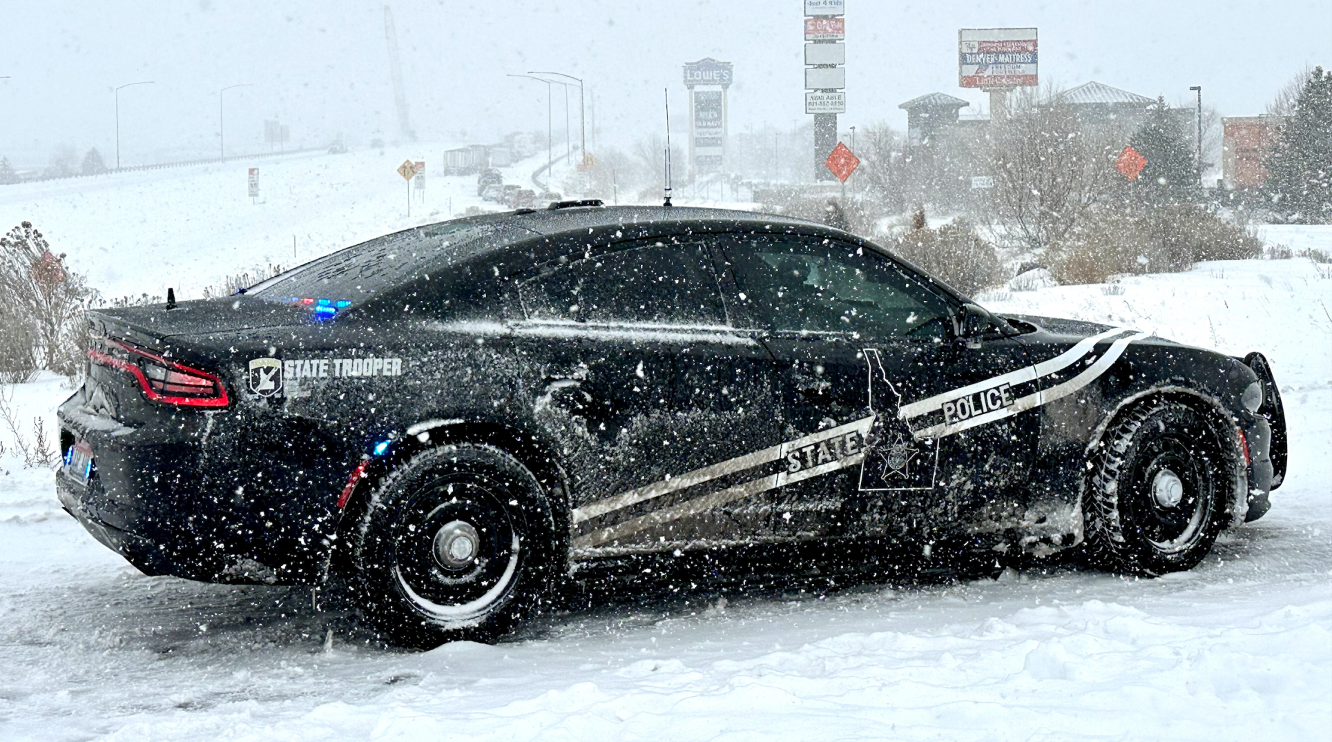 State police car during snowstorm
