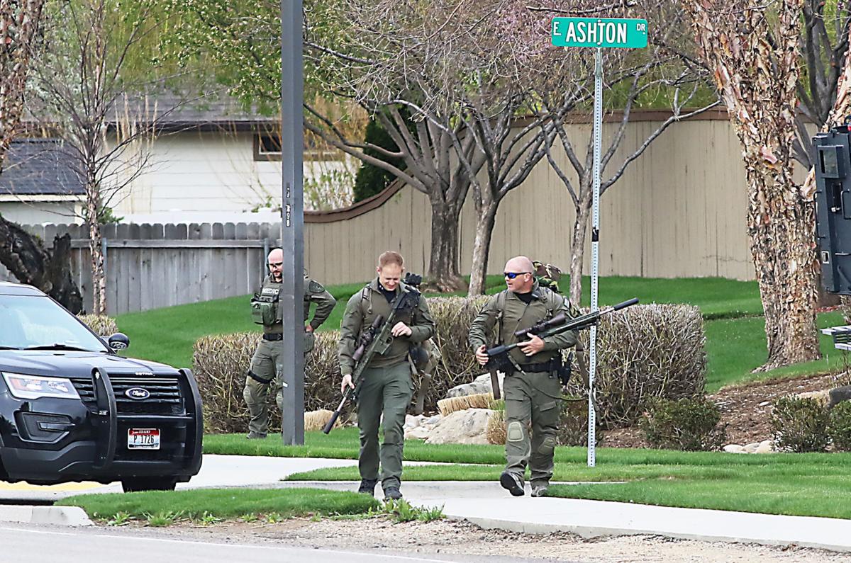 Three suspects charged in fatal shooting that led to standoff Local