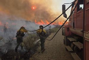 Gov. Brad Little authorizes Idaho National Guard deployment for 300,000-acre wildfire