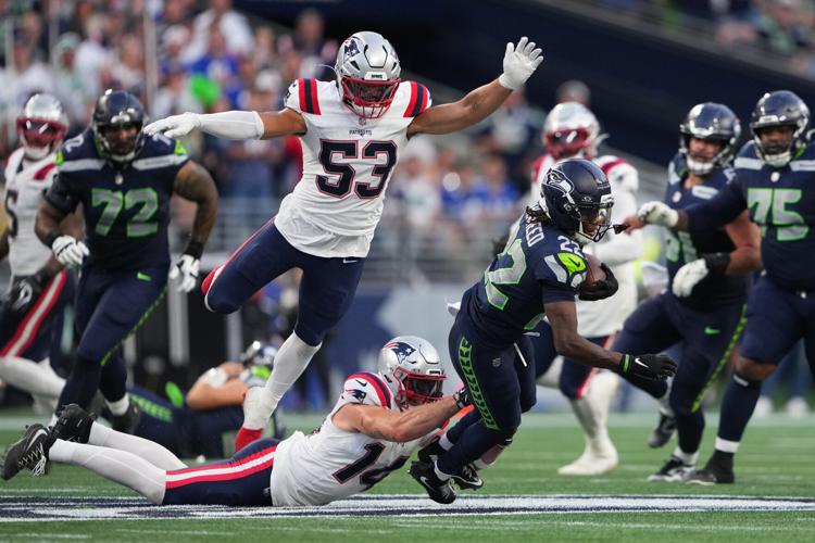 Photos of the NFL season opener, a rare Super Bowl rematch between the Seahawks and Patriots