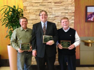 Three men honored for economic development assistance