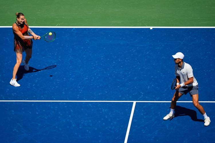 Top tennis stars team up for the U.S. Open mixed doubles tournament, in photos