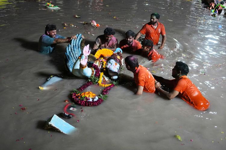 India celebrates the elephant-headed god Ganesha, in photos