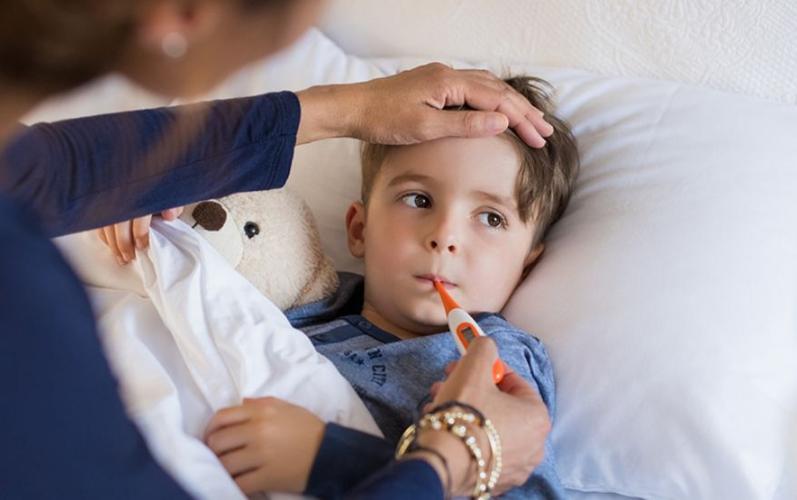 Child sick with flu stock image