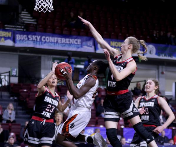 Diaba Konate in traffic at the rim.jpg