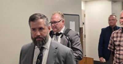 Peck walking out of court